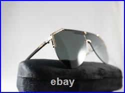 Gucci GG0584S 002 Grey Lens Gold Oversized Shield Sunglasses with Velvet case