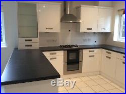 High gloss white quality used kitchen with some appliances. Re-list (see below)