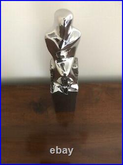 Metal chrome stainless steel abstract art ornament figure seated A L O 1/9